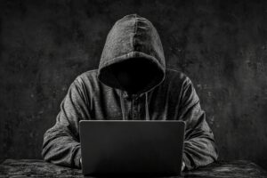 Hacker, Cyberkrimineller bei der Arbeit